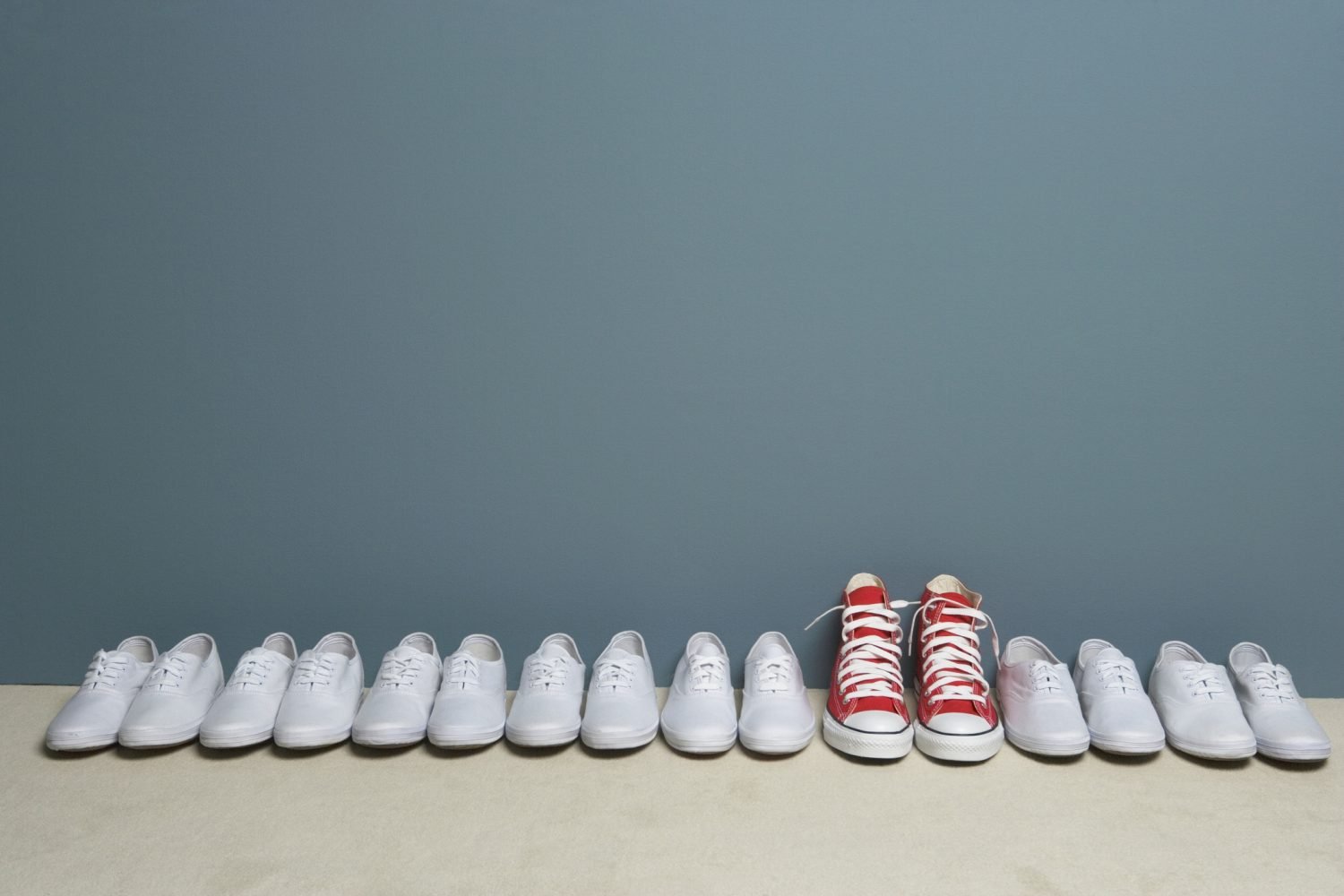 distinctive branding separating tall red shoes from plain white ones